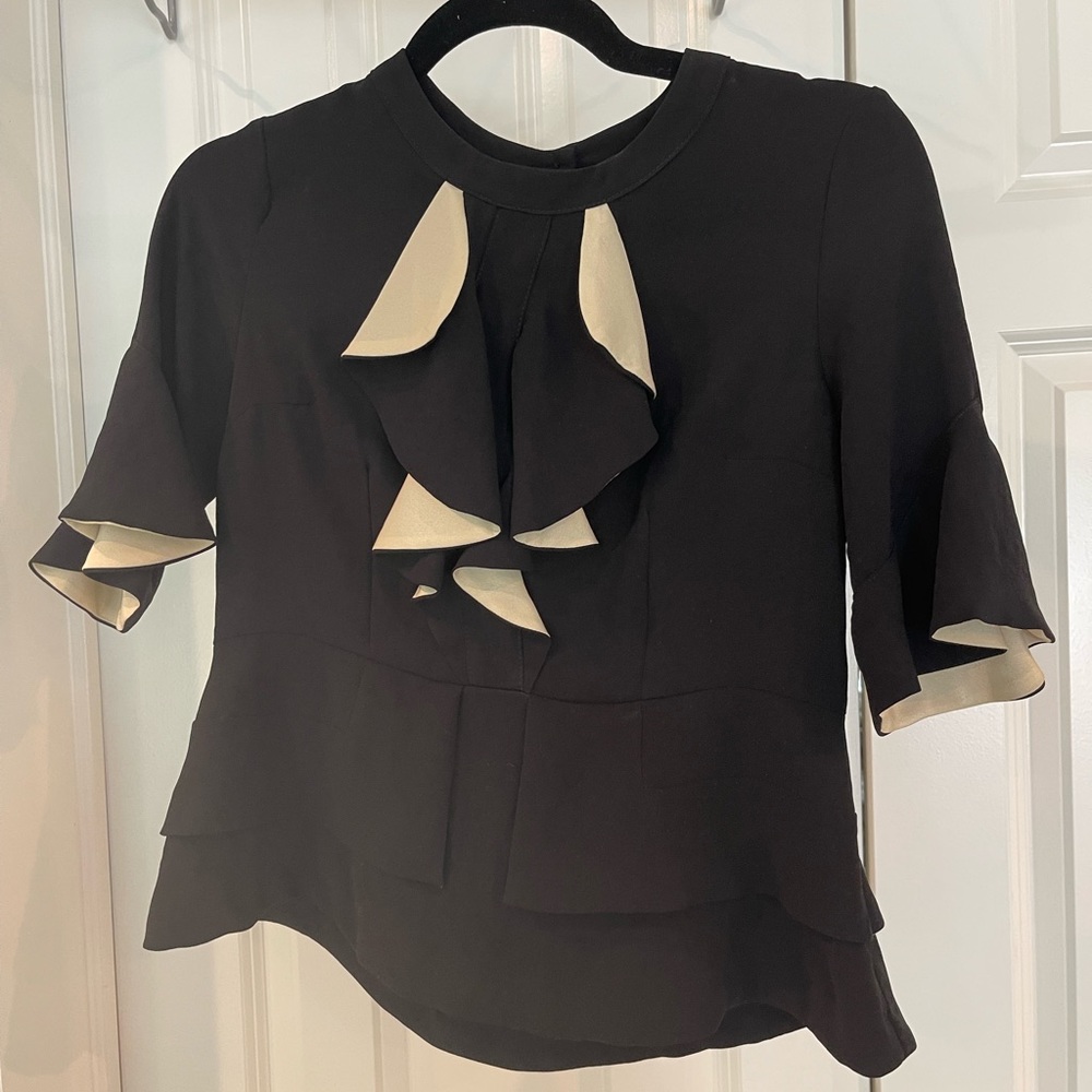 blacks and white blouse